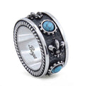 Fleur de Lis Rolling G.s Ring in Sterling Silver